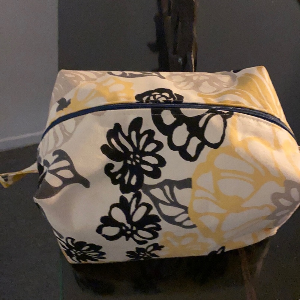 Large floral new cosmetic boxed bag with zippered opening. 9” x 5 x6